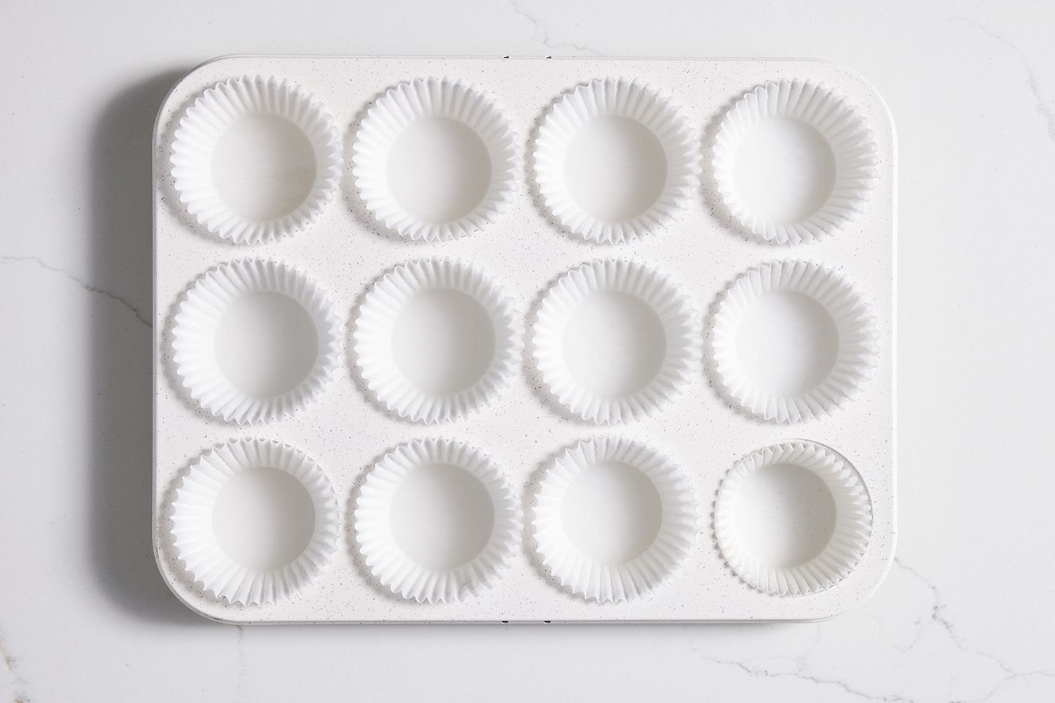 muffin pan lined with muffin liners