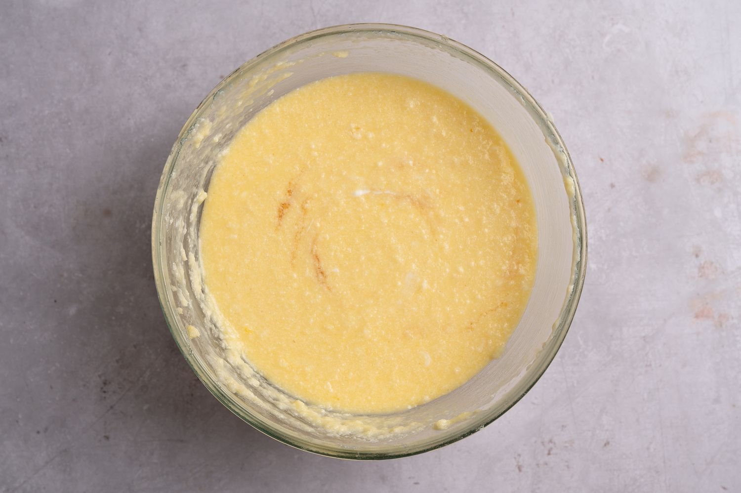Vanilla, milk, and sour cream added to the batter