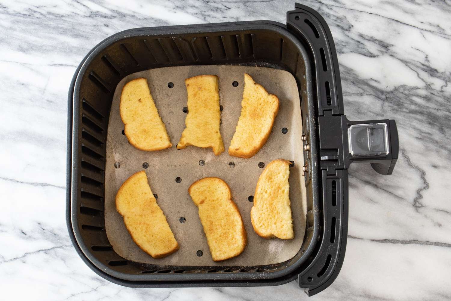 french toast sticks in the air fryer, ready to cook