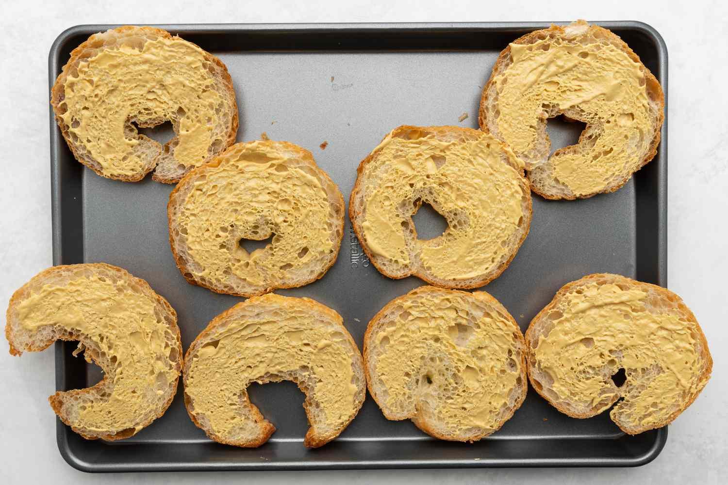 Mustard spread on croissant halves