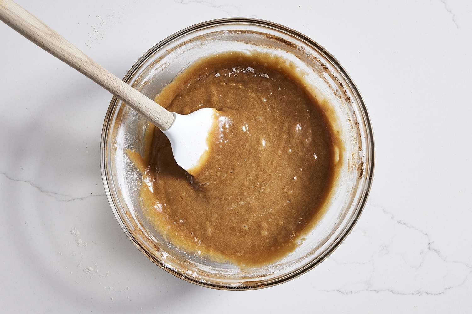 Flour folded into batter with spatula