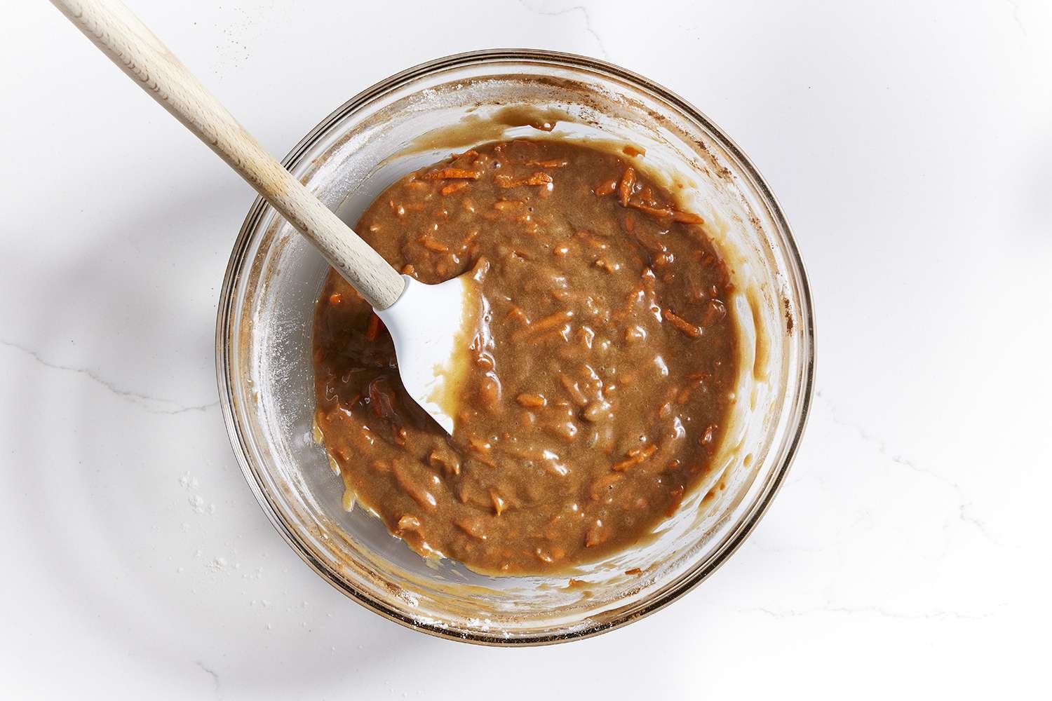 Shredded carrots folded into batter