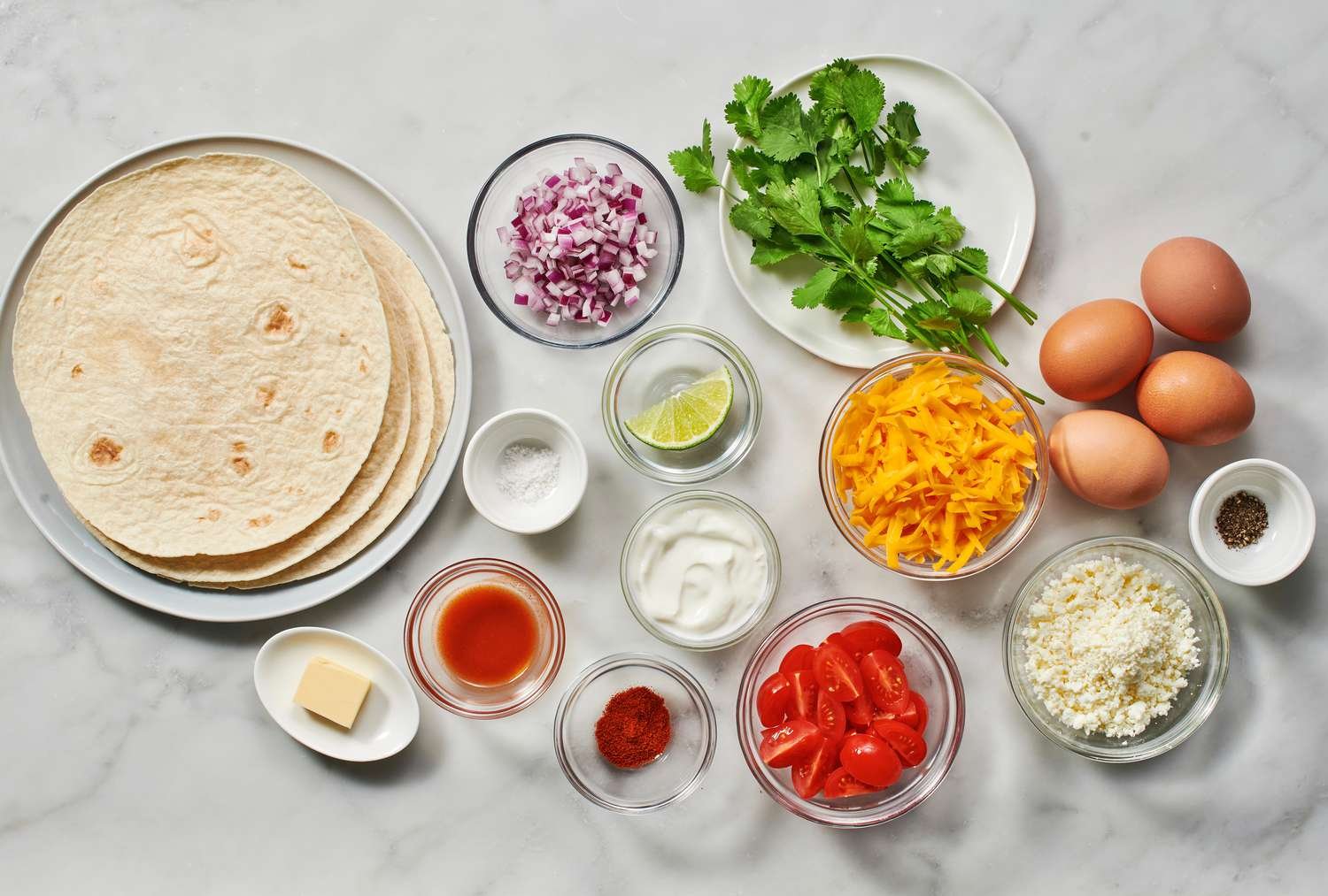 Ingredients to make quesadilla breakfast tacos