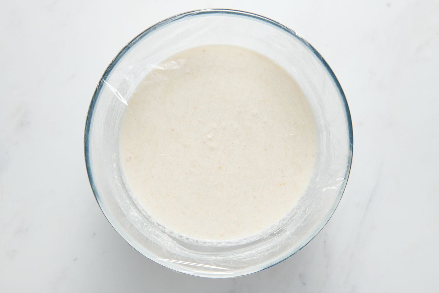 Covered bowl of batter for fermentation