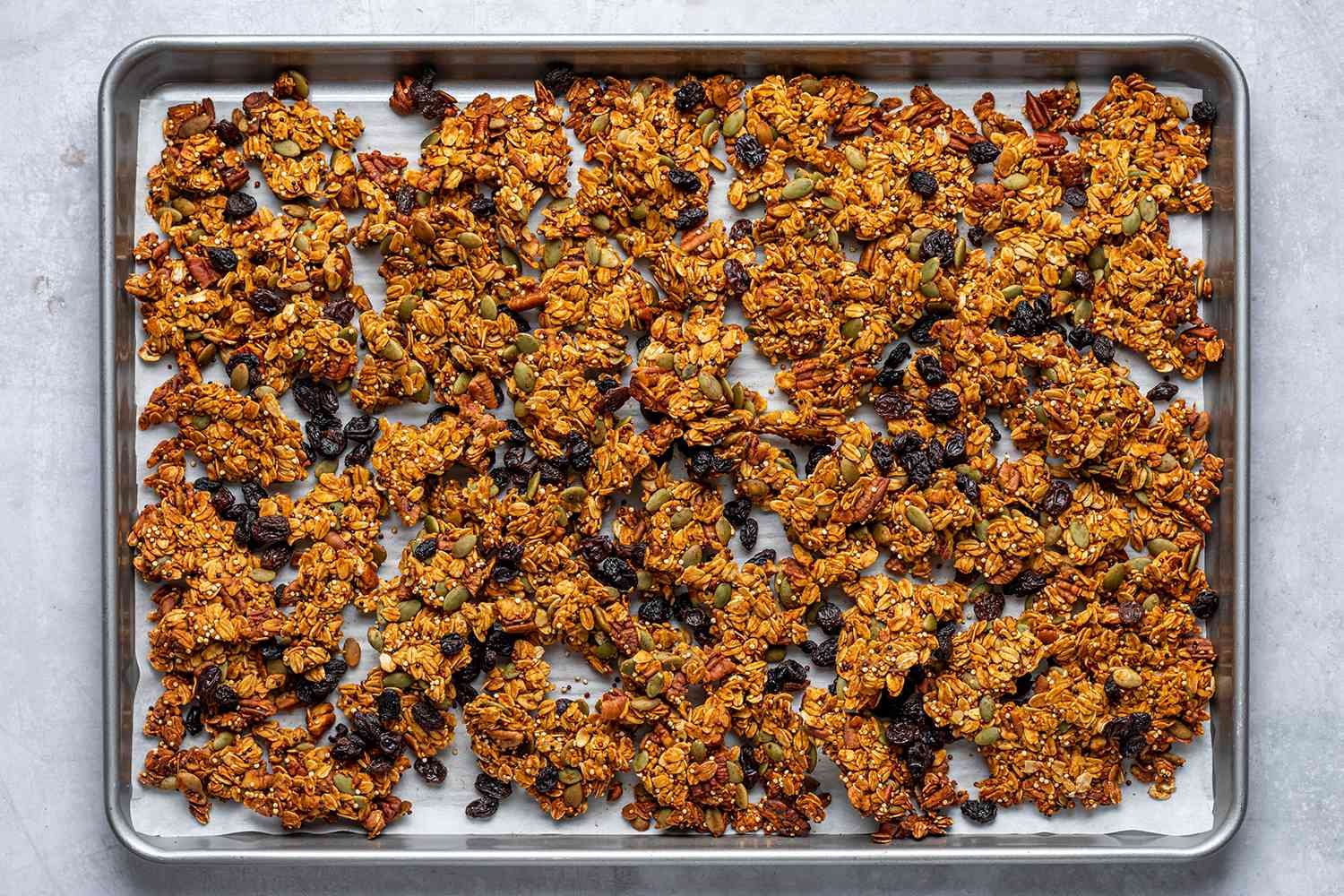 cooled granola on a baking sheet