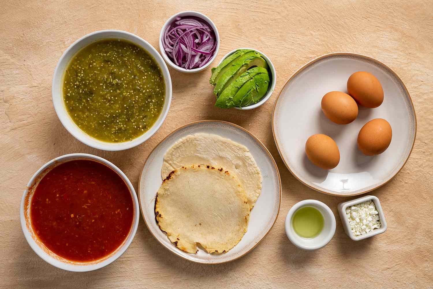 Huevos Divorciados ingredients in bowls 