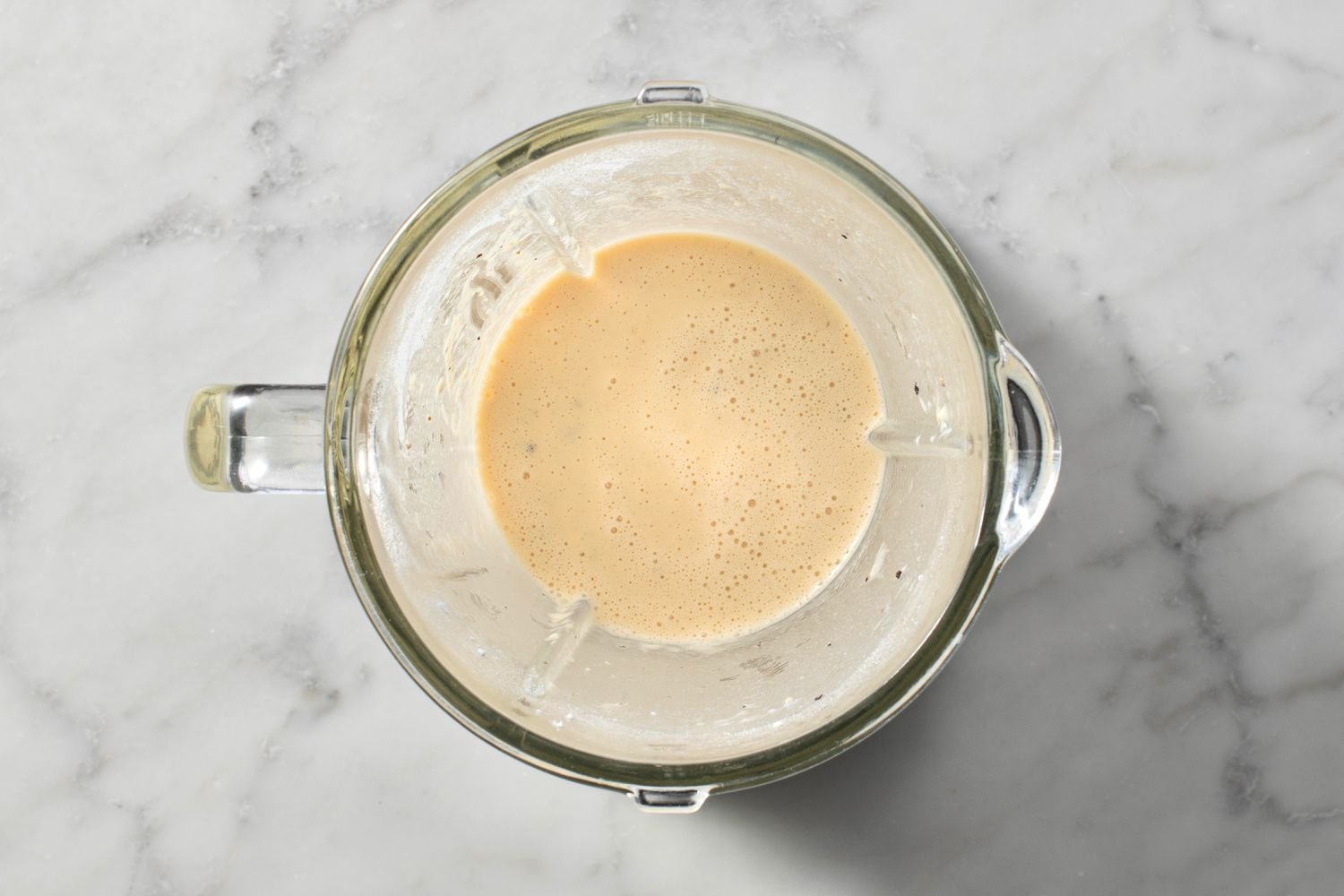 Eggs, milk, flour, melted butter, salt, and pepper blended together in a blender