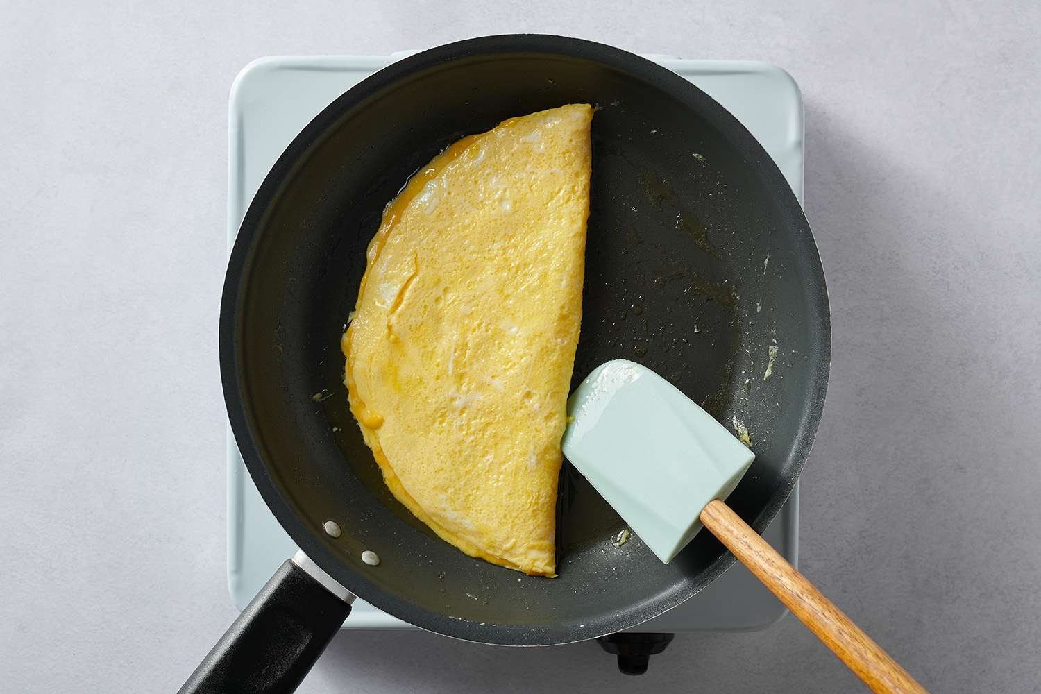 eggs cooking in skillet
