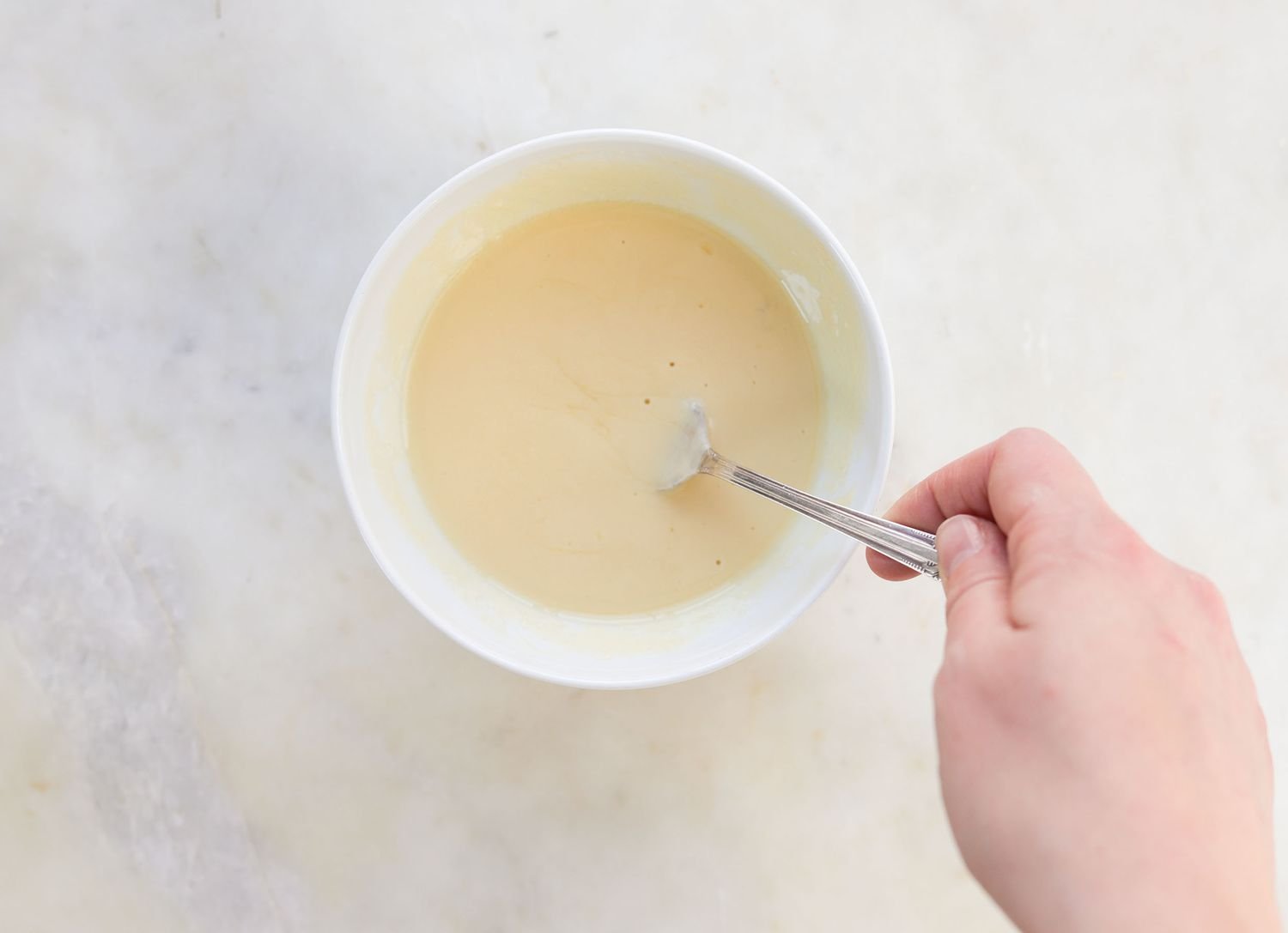 Whisking together custard