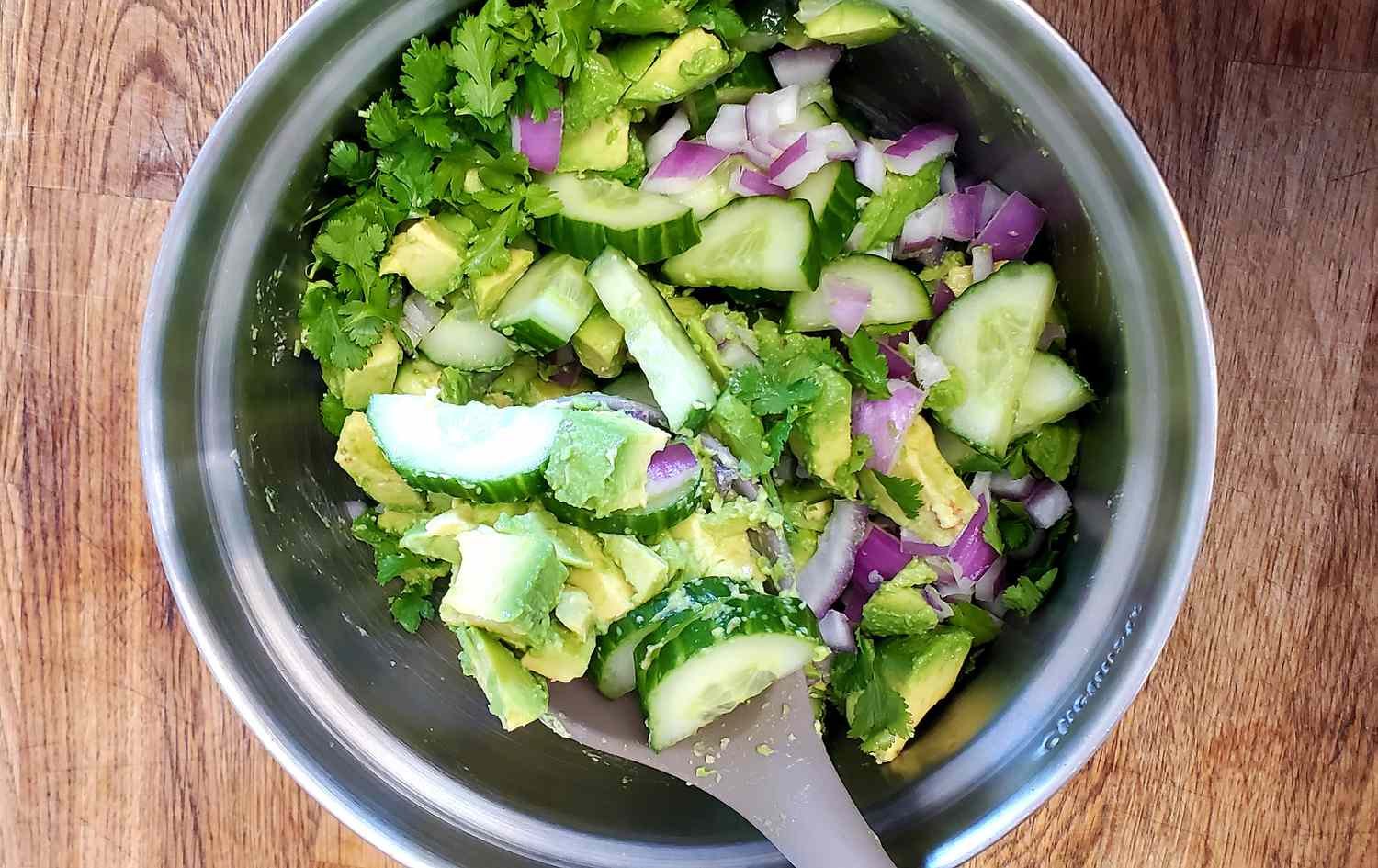 Avocado and vegetables mixed with seasoning