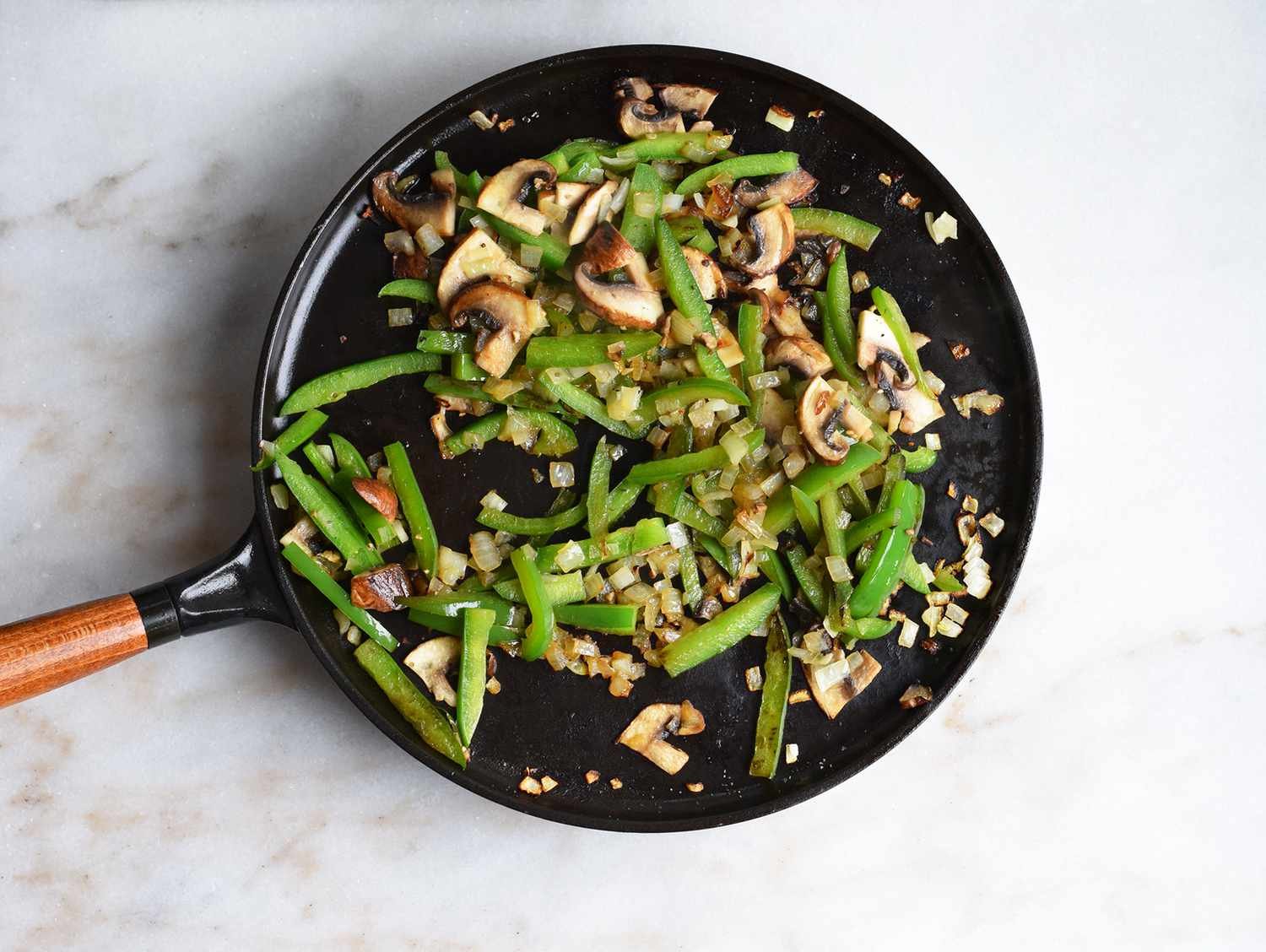 Sautéed peppers, mushrooms, and onions