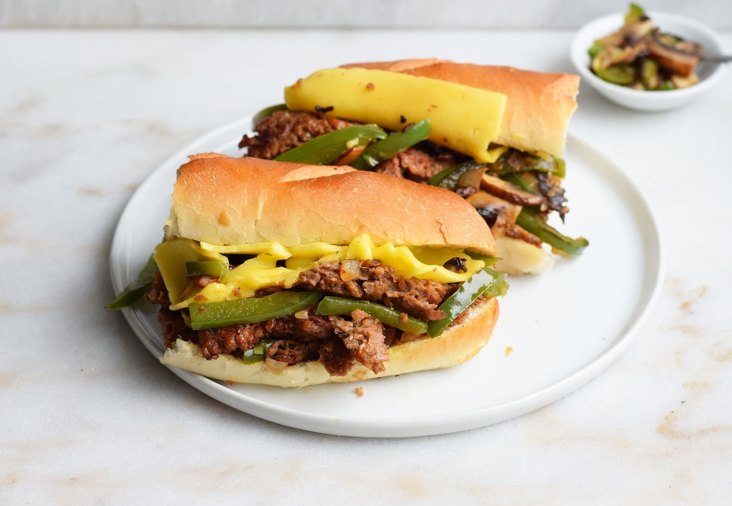 Beyond meat Philly cheesesteak in a roll