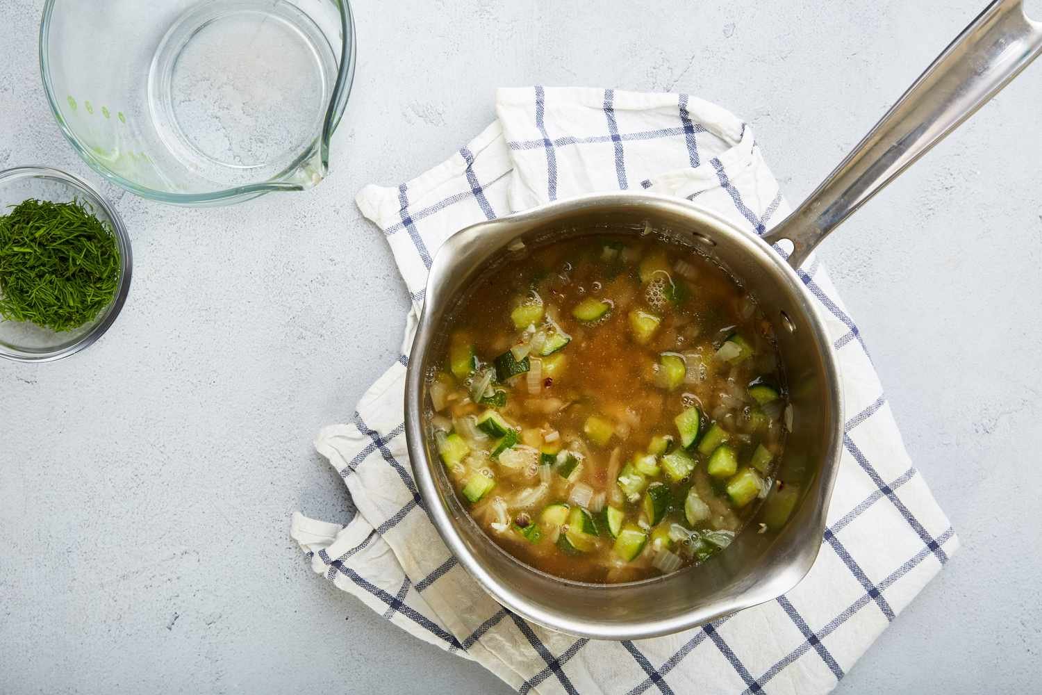 Add vegetable broth to pan
