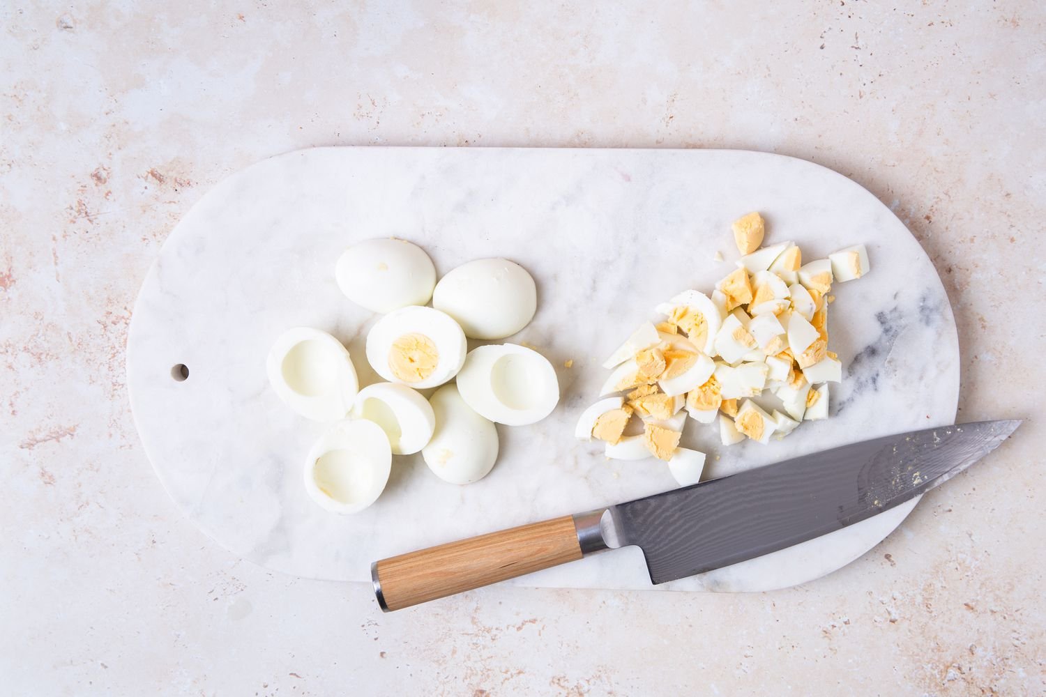 Diced eggs on a cutting board