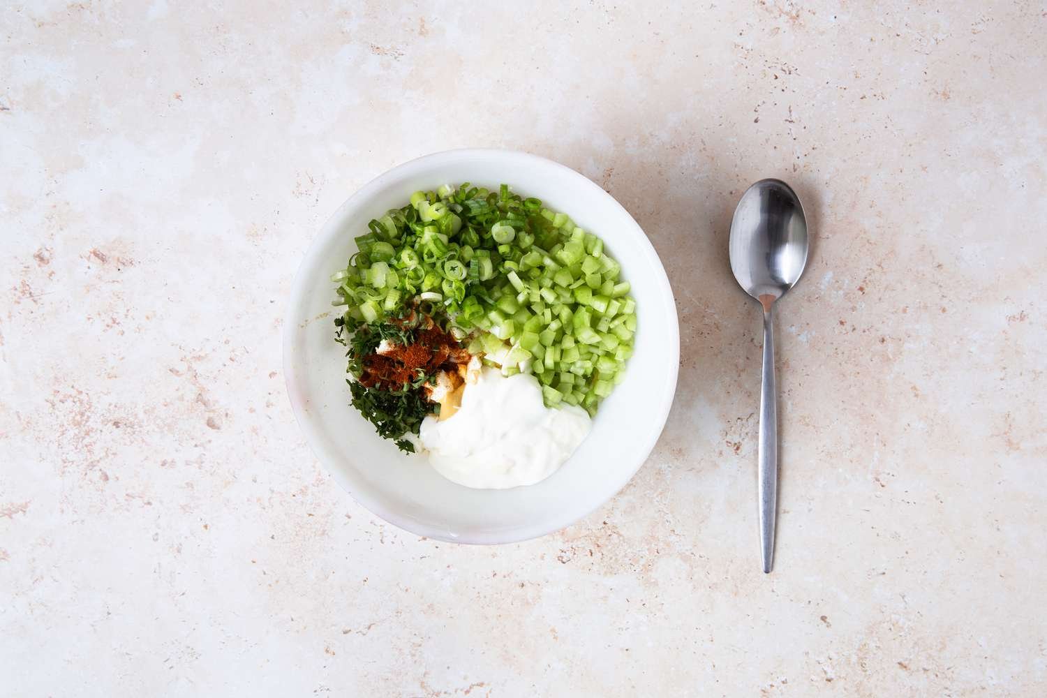 Creamy Egg Salad ingredients in a bowl