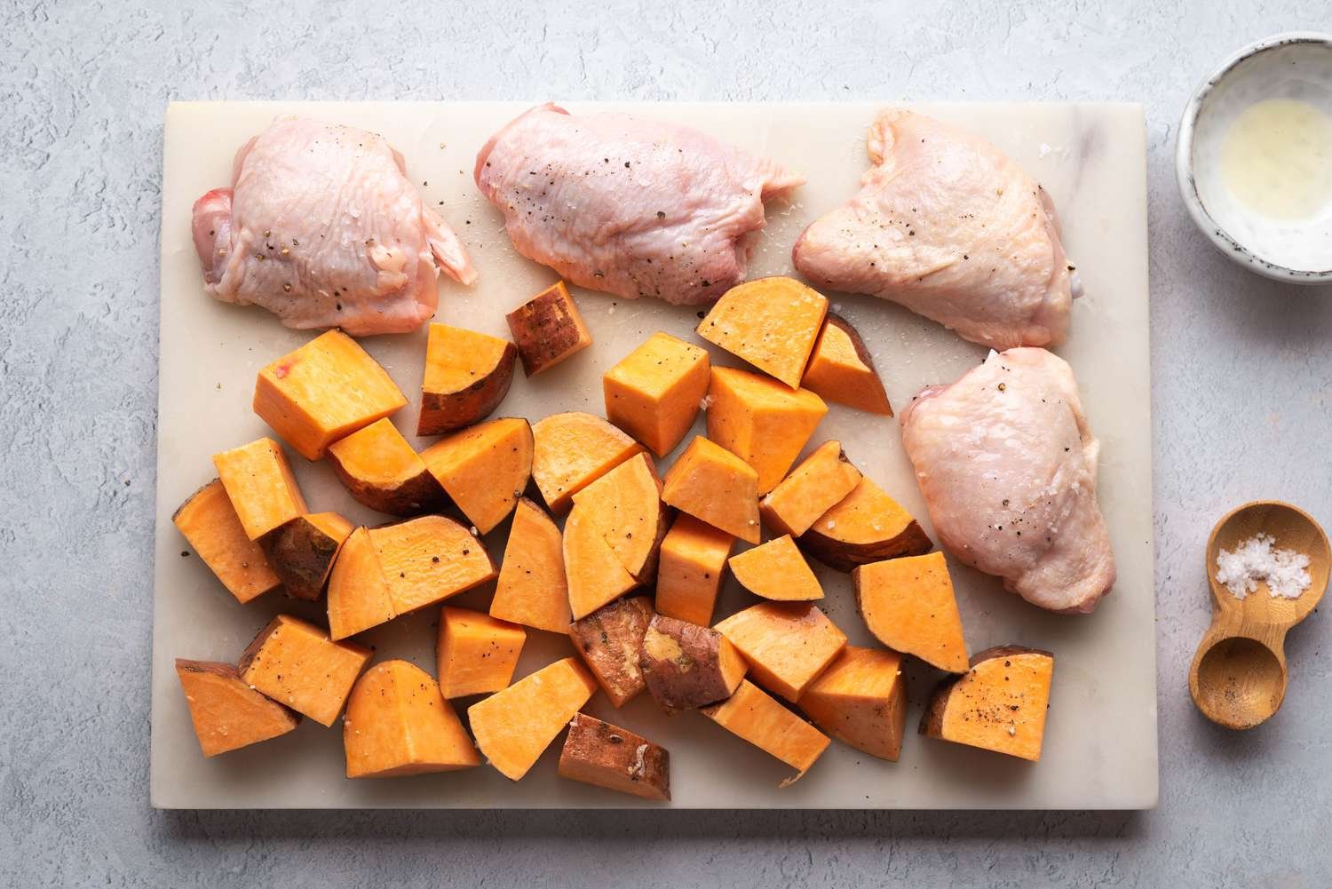 Coating Chicken and Sweet Potatoes with Oil