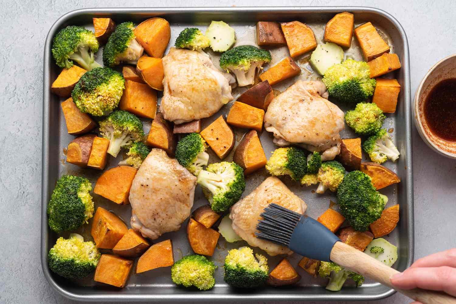 Adding Broccoli to Sheet Pan