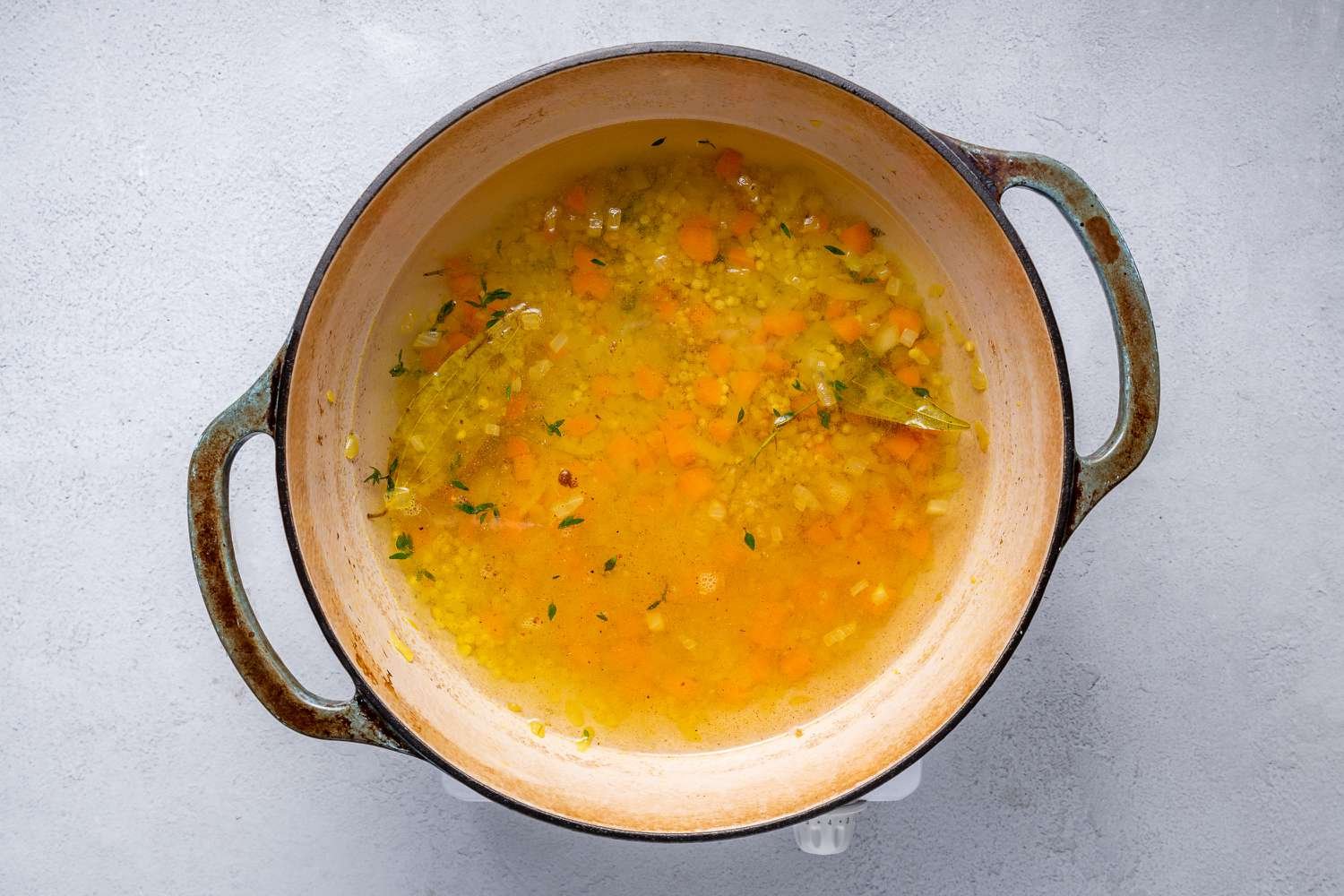 Broth and seasonings in a pot